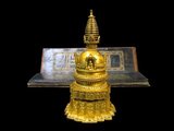 Mongolian Buddhism: Gilded stupa and a prajnaparamita ('Heart of Perfect Wisdom') text from the 18th century CE. Photo by Gryffindor (CC BY-SA 3.0 License).
