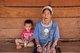 Thailand: Akha woman and child at Ban Huai Kee Lek, Chiang Rai Province, Northern Thailand