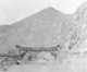 A traditional bridge across the Wenxian River in the badlands of Gansu, c. 1900.