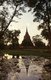 Thailand: The sun sets over Sukhothai Historical Park