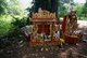 Thailand: Chinese-style spirit houses and ancestor shrines around a tree near the Kamphaeng Phet lak mueang or city pillar, Kamphaeng Phet Historical Park